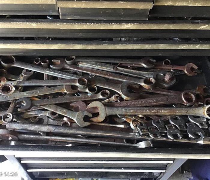 Burnt wrenches in a toolbox