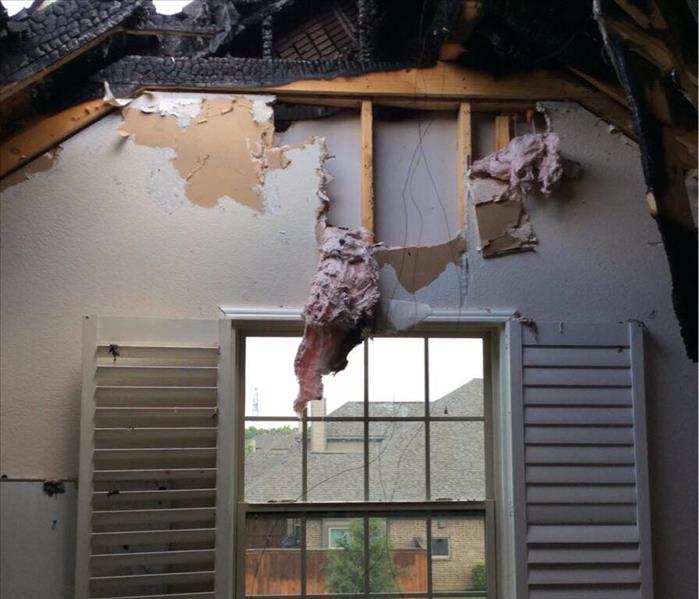 Fire damage to an upstairs bedroom