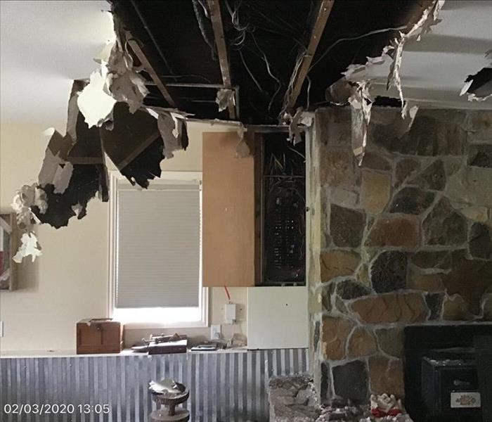 Ceiling torn down from a burst pipe