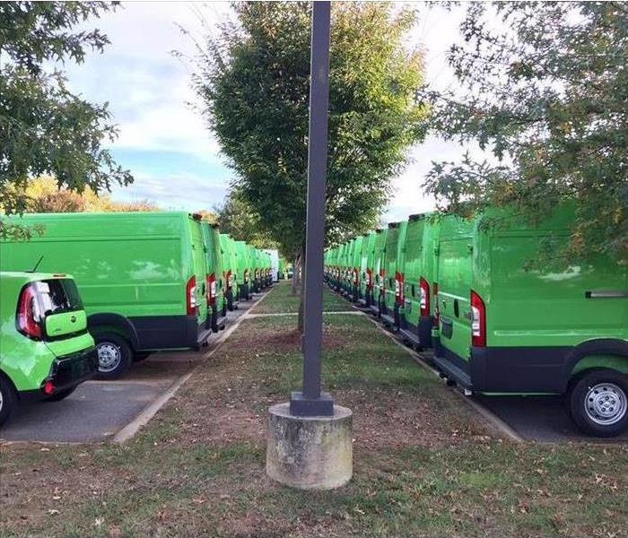 Dozens of SERVPRO green vans 